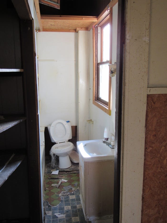 A bathroom in disarray